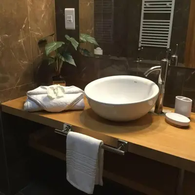 a bathroom with a large bowl sink on a counter at Apartment Rosmaninho-Hosted by Sweetstay in Quarteira