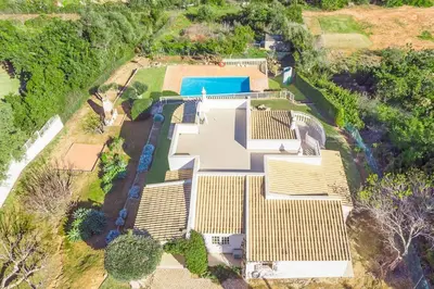 an overhead view of a house with a swimming pool at Villa Gabie in Albufeira