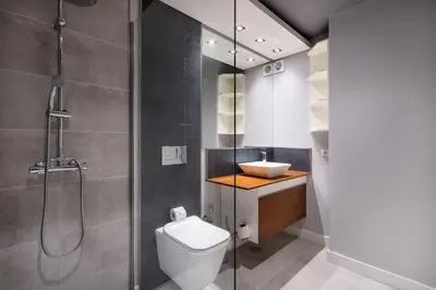 a bathroom with a shower and a toilet and a sink at Varandas do Sol by Garvetur in Vilamoura