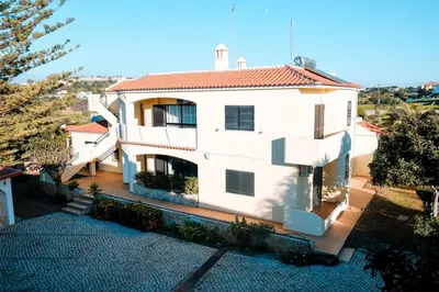 an aerial view of a white building at Villa Miracampo - Elegant Secret in Albufeira