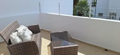a large body of water with a city in the background at Casinha do sul- Private pool in Albufeira