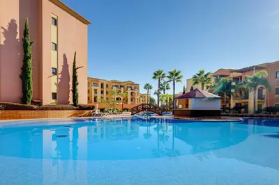 an aerial view of a resort with a swimming pool at The Prime @ The Residences Vilamoura in Quarteira