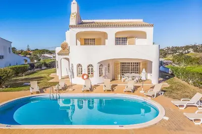 an overhead view of a building with a swimming pool at Villa Natalia Sun in Albufeira