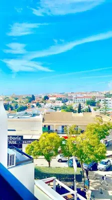a view of a city with trees and buildings at Resort Albufeira T1, Praia da Oura in Albufeira
