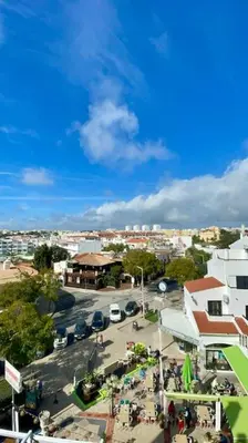 an overhead view of a town with a parking lot at Resort Albufeira T1, Praia da Oura in Albufeira