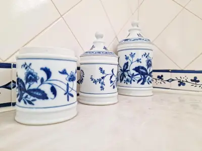 a group of blue and white vases sitting on a counter at Villa Vale de Ursa - 16 - BY BEDZY in Sesmarias