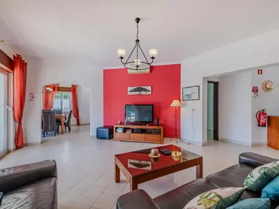 a kitchen with white cabinets and a refrigerator at Holiday Home Paulo - VIP Properties by Interhome in Galé