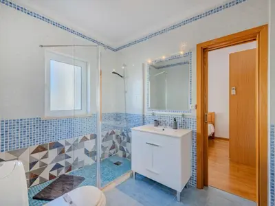 a bathroom with a shower and a sink at Holiday Home Camélias VIP Properties by Interhome in Albufeira