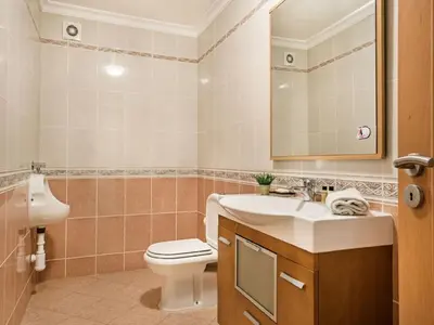 a hotel room with two beds in a room at Villa Monte Sol - VIP Properties by Interhome in Azinhal