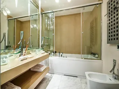 a bathroom with a tub and a sink at Outstanding Algarve Villa 8 Bedrooms Villa Agua Grande Deluxe Seaviews in Albufeira