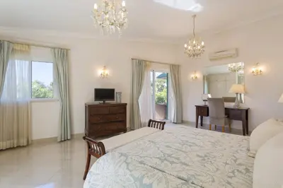 a large yard with a white house and trees at Extravagant Vale Do Lobo Villa 5 Bedrooms Villa Bispo Deluxe Great Pool in Almancil