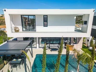 an aerial view of a house with a swimming pool at Villa Kambole in Albufeira