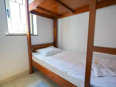 a bedroom with two bunk beds and a window at Oura Sunrise 16 Apartment by Stay ici Algarve Holiday Rental in Albufeira