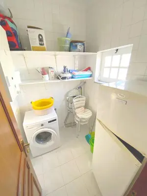 a bedroom with a bed and a mirror at Villa Belavista - Moradia para Famílias in Albufeira