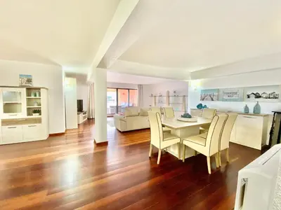 a living room with a table and chairs at Marina Garden by Ethnic Ocean in Vilamoura