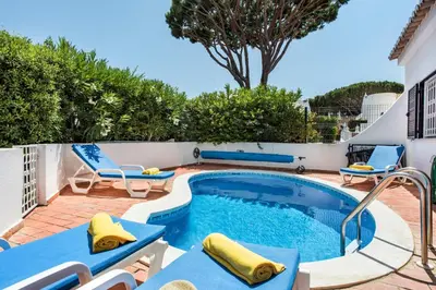 an aerial view of a resort with a swimming pool at Mng Elliott76 in Vale do Lobo