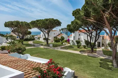a view of the garden from the house at Mng Elliott71 in Vale do Lobo