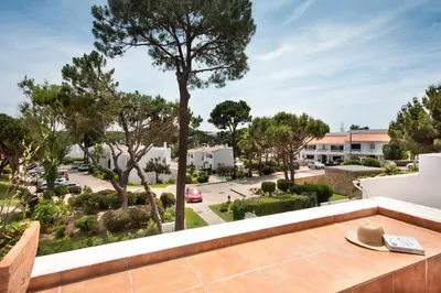 a view from the balcony of a house with a table at Mng Elliott90c in Vale do Lobo