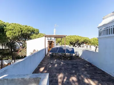 a table on the roof of a building at Akisol Faro Relax in Faro
