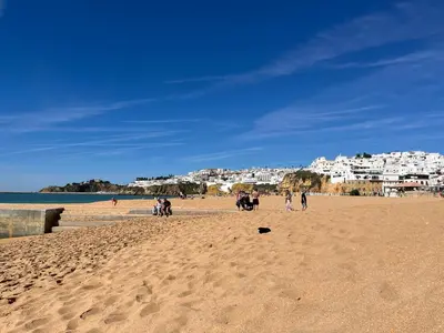 a table and two chairs on a balcony with a view at Bela Vista in Albufeira
