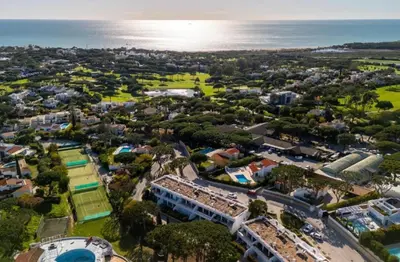 an aerial view of a city with the ocean at Casa Vale do Lobo in Vale do Lobo