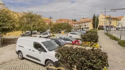 a white van parked on the side of a street at T3 Triplex Vista Mar Marina de Vilamoura-Greice Homes in Vilamoura