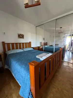 a table with a box and two books on it at Casa Amarela in Faro