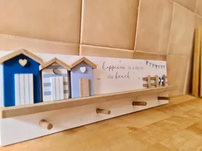 a shelf with books and a sign on it at Fig Villa- CleverDetails, Sleep 8, Pool, Children Playground, Ténis court in Vilamoura
