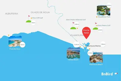 a map of algarve with a red marker at Marina Family Duplex with Pool in Quarteira