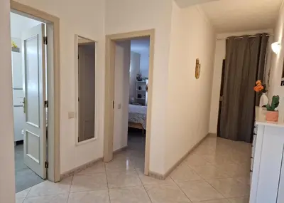 a door in a building with a sign on it at Casa Kari in Albufeira