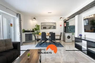 a living room with a couch and a table at #268 Marvellous Villa Sapphire in Albufeira