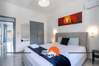 a bedroom with a bed with a love monday sign on it at #268 Marvellous Villa Sapphire in Albufeira