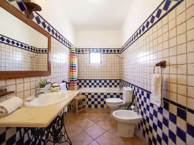 a bathroom with a sink and a toilet at Holiday Home Monte da Calma by Interhome in Albufeira