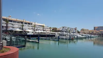 a group of boats docked in a marina at Vilamoura Dream House QR2 in Quarteira
