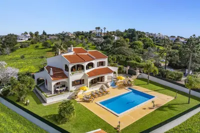 an aerial view of a house with a swimming pool at Villa Vista Mar by Villa Plus in Terras Novas