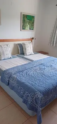 two beds sitting next to each other in a bedroom at AA Apartamento Solar dos Pinheiros in Vilamoura