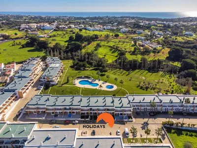 an aerial view of a resort with a swimming pool at #226 Vila LII by Home Holidays in Albufeira