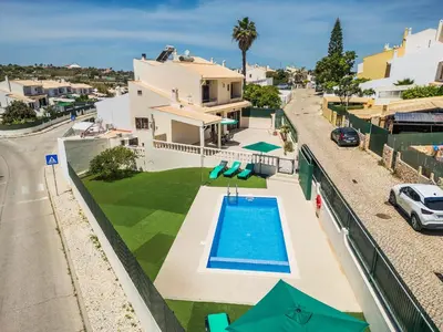 an aerial view of a house with a swimming pool at Villa Krishan Albufeira - Private Pool in Albufeira
