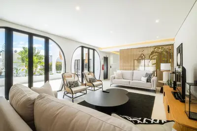 a living room with a couch and a table at Valbom Luxury Village in Galé