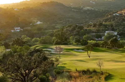 a view of a golf course with a green at Viceroy at Ombria Algarve in Loulé