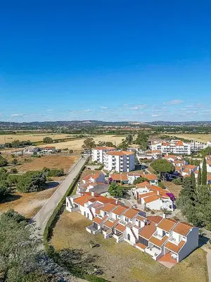 an aerial view of a small town with houses at Villa Golden Falésia by HelloVacations in Albufeira