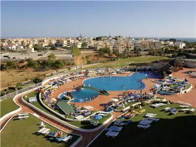 an aerial view of a swimming pool in a resort at Perfect Albufeira 1 Bedroom apartment in Albufeira