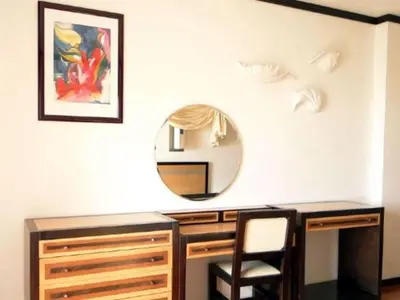 a dressing room with a mirror and a desk at Perfect Albufeira 1 Bedroom apartment in Albufeira