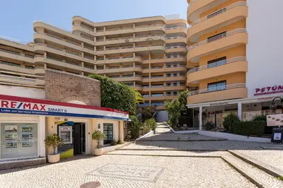 an empty street in front of a building at MILA - Vilamoura in Vilamoura