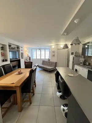 a kitchen and living room with a table and a dining room at Rui's Studio - Farmvillage - Free Wifi in Albufeira