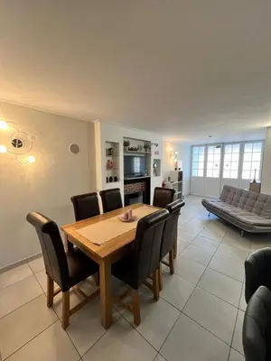 a dining room and living room with a table and chairs at Rui's Studio - Farmvillage - Free Wifi in Albufeira