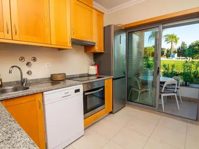 a kitchen with a sink and a dishwasher at White 47 House by Stay ici Algarve Holiday Rental in Albufeira