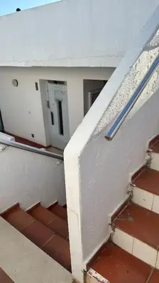 an overhead view of a staircase in a building at Albufeira - Sun, Pool and Marina View! in Albufeira