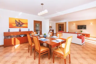 a dining room with a table and chairs at Villa Maya Bay by Algarve Vacation in Guia