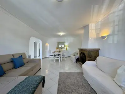 a bedroom with two beds and a window at Faro Terrace Villa by Homing in Faro